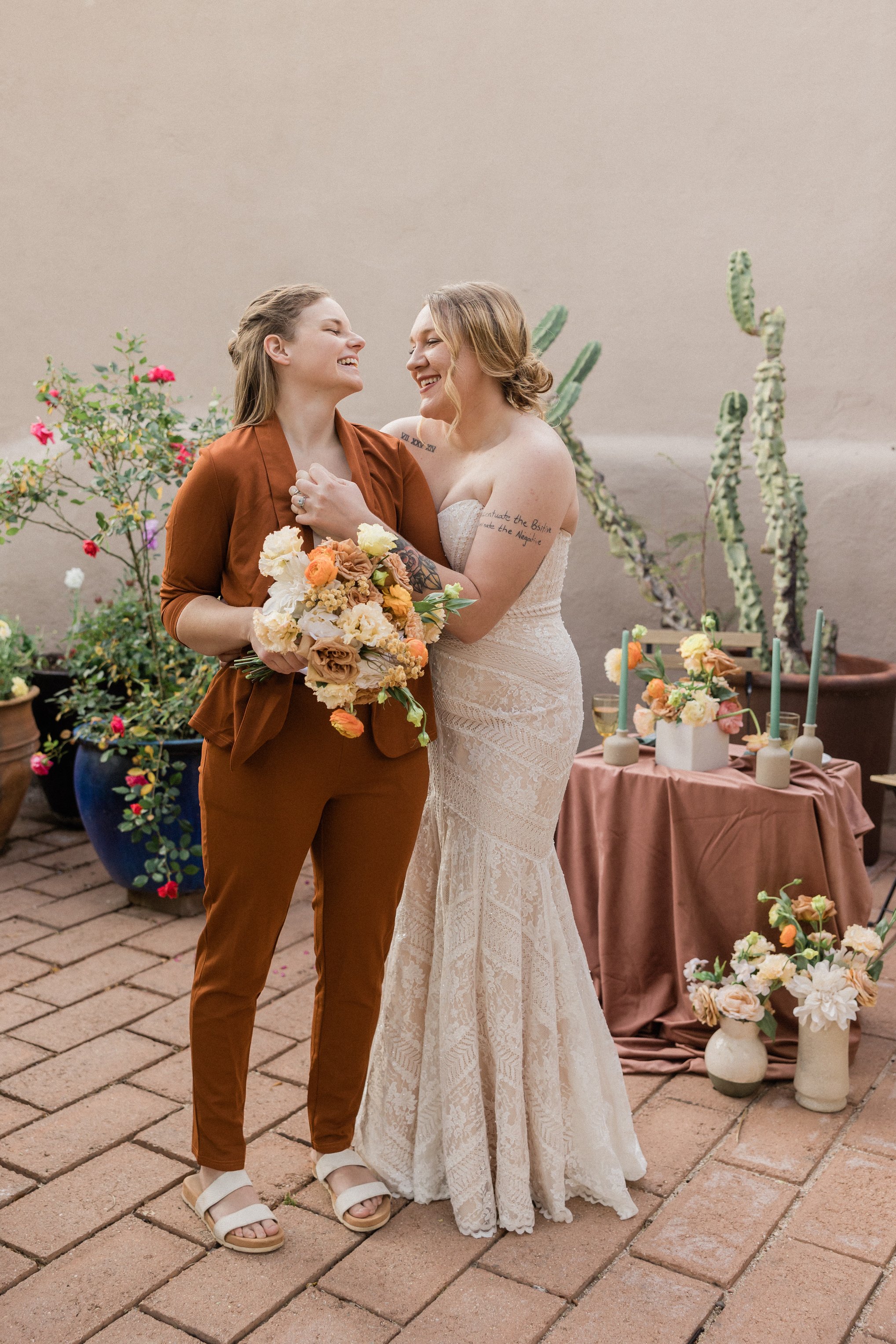 Newlywed Couple with Bridal Bouquets at the Reception